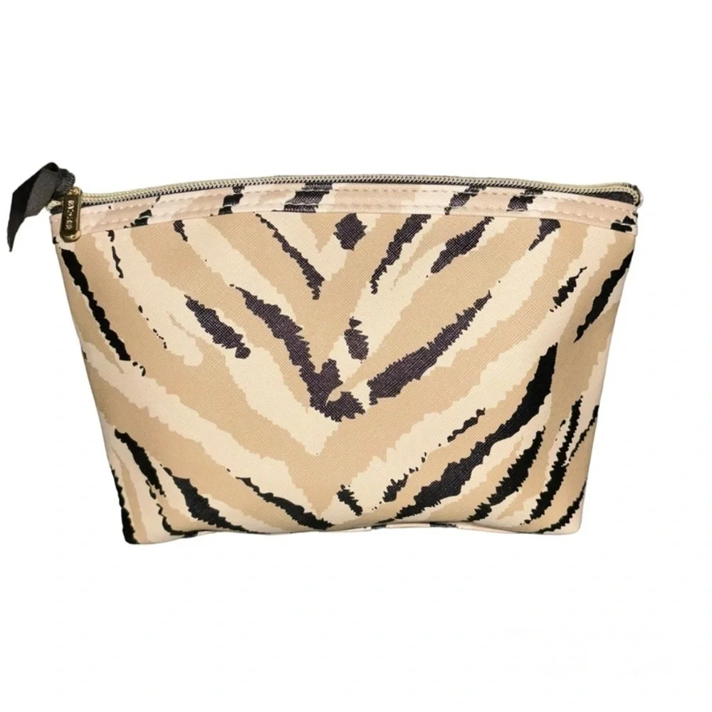 Ruby Cash animal print top zipper makeup bag. Black, tan and cream.